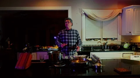 Paranoid man looking out window Video stock 99499839