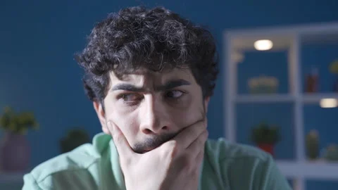Paranoid young man with distrust and suspicion of others is having a seizure. Stock-Footage 228866533
