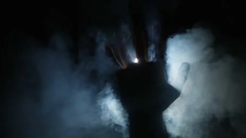 Paranormal activity. Hand in smoke. Video stock 155993242