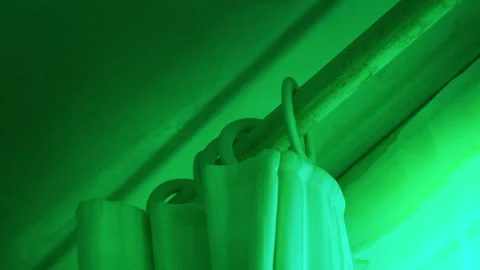 Paranormal Force Throwing Curtain Around In Green Glow Stock Footage 257714894
