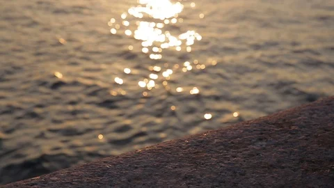 Parapet on the waterfront at sunset Stock Footage 88589640
