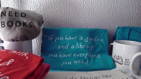 Paraphernalia of We Need Books library reading If you hae a garden and a lib Stock-Footage 142073293