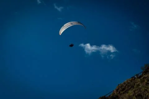 A paraplan in a blue sky Stock Photos