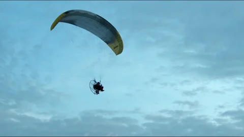 Paraplan in the evening sky Stock Footage 139038511