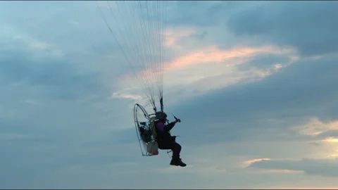 Paraplan in the evening sky Stock Footage 139046861
