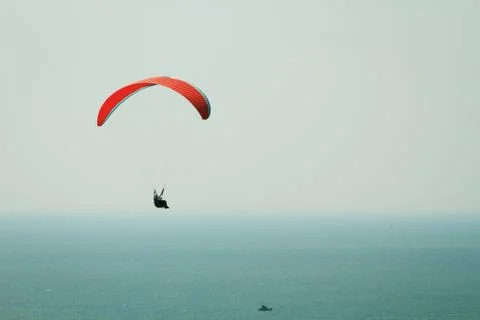 Paraplane flight. Paraplane flight over the sea 写真素材