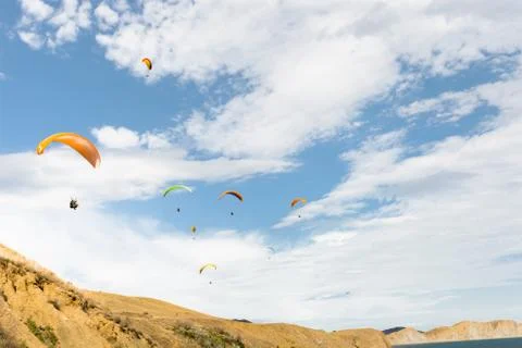 Paraplane flying high up Stock-Fotos