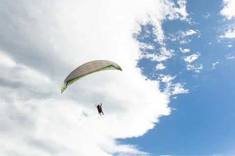 Paraplane flying high up 写真素材