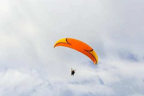 Paraplane flying high up 写真素材