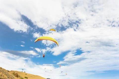 Paraplane flying high up Stock-Fotos