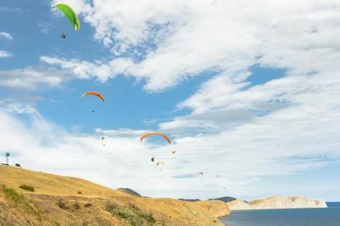 Paraplane flying high up Stock-Fotos