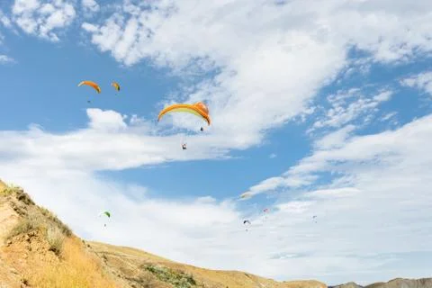 Paraplane flying high up 写真素材