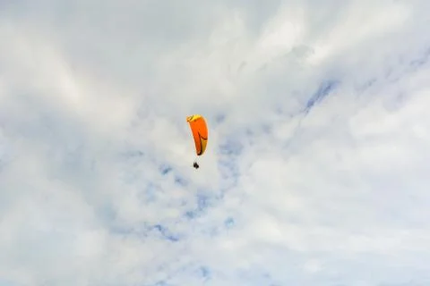 Paraplane flying high up 写真素材