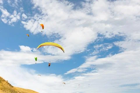 Paraplane flying high up Stock Photos