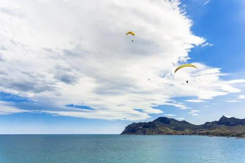 Paraplane flying high up Stock-Fotos