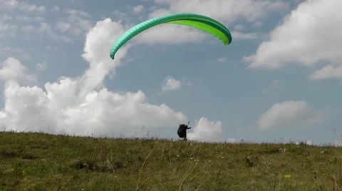 Paraplane trying to fly, but was unable to catch the wind Stock Footage 62316613