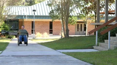 Paraplegic Rolling Up Stock Footage 12530642