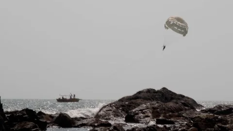 Parasailing is an active form of recreation in Arabian sea Stock Footage 93743845