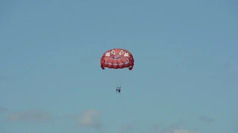 Parasailing behbehind boat Stock Footage 11581394