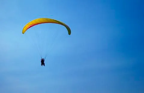 Parasailing in a blue sky Stock Photos