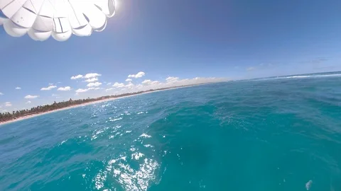 Parasailing couple having fun on vacation blue sky Vídeo Stock 87056990