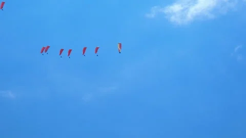 Parasailing gliders above clouds. Stock Footage 244084323