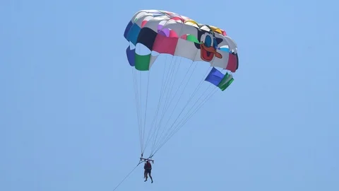 Parasailing High In The Blue Sky Stock Footage 96587155