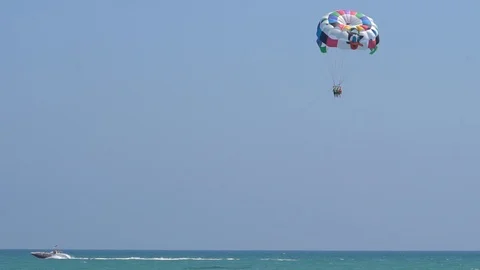 Parasailing High In The Blue Sky Stock Footage 96587265