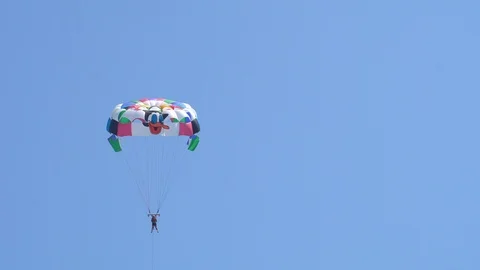 Parasailing High In The Blue Sky Stock Footage 96587274