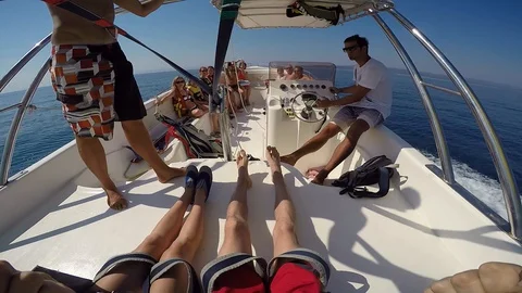 Parasailing launch from deck of speed boat in Adriatic crystal blue sea w/ crew Stock-Footage 128362506