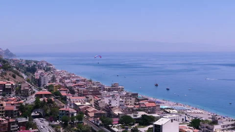 Parasailing Over The Coast in Greece Video stock 242353763
