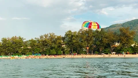 Parasailing over the ocean, slow motion view Vídeos de archivo 247856137
