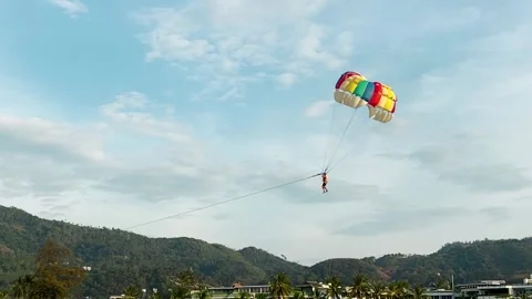 Parasailing over the ocean, slow motion view Vídeos de archivo 329229506