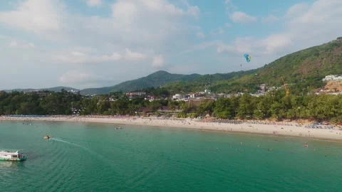 Parasailing Over Patong Beach Drone Tracking Shot Phuket Thailand Vídeos de archivo 336570121
