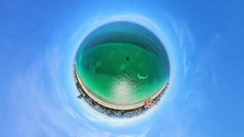 Parasailing over a tiny planet Miami Beach Stock Footage 334760214