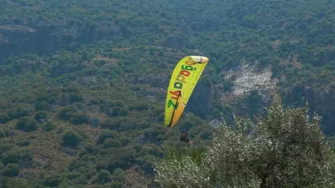 Parasailing with parachute in weekend. Stock Footage 240878584