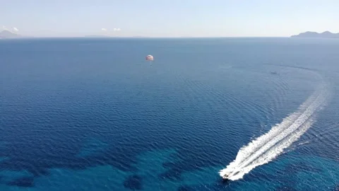 Parasailing on the sea Stock Footage 155596183