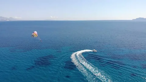 Parasailing on the sea Stock Footage 155596191