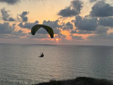 Parasailing at Sunset Stock Photos