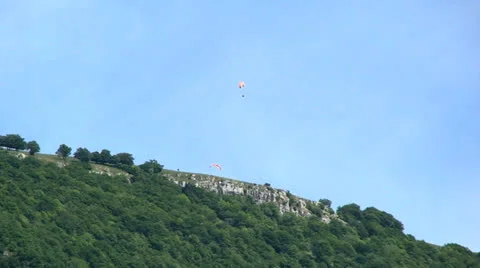 Parasailing take of from mountain Stock Footage 24821255