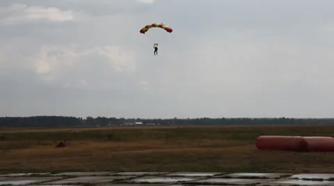 Parashutist landing Stock Footage 8658457