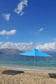 Parasol at the beach Stock Photos