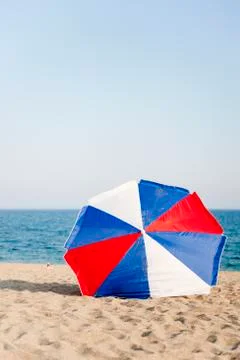 Parasol at the beach Stock Photos