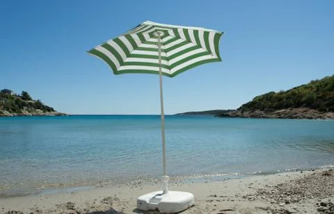 Parasol on the beach Stock Photos