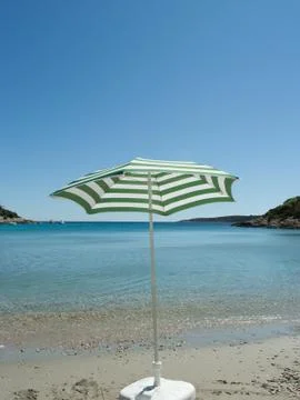 Parasol on the beach Stock Photos