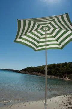 Parasol on the beach Stock Photos