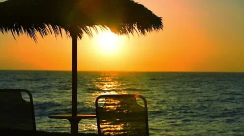 Parasol on the beach at sunset 動画素材 45584019