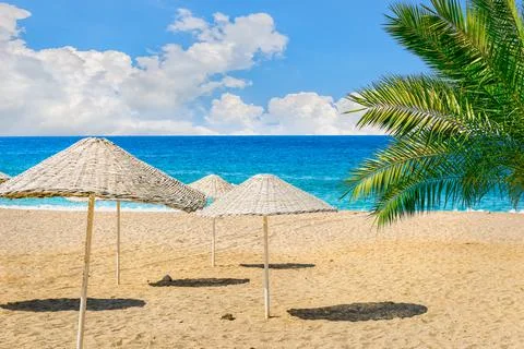Parasols on the beach Stock Photos