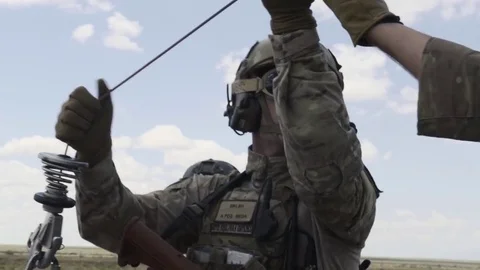 Parasrescue men working with winch attached to helicopter Stock-Footage 85302958