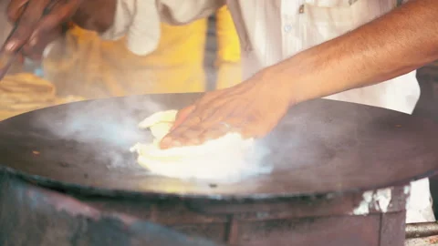 Paratha bread making in pan, Delhi, India Stock Footage 184020903